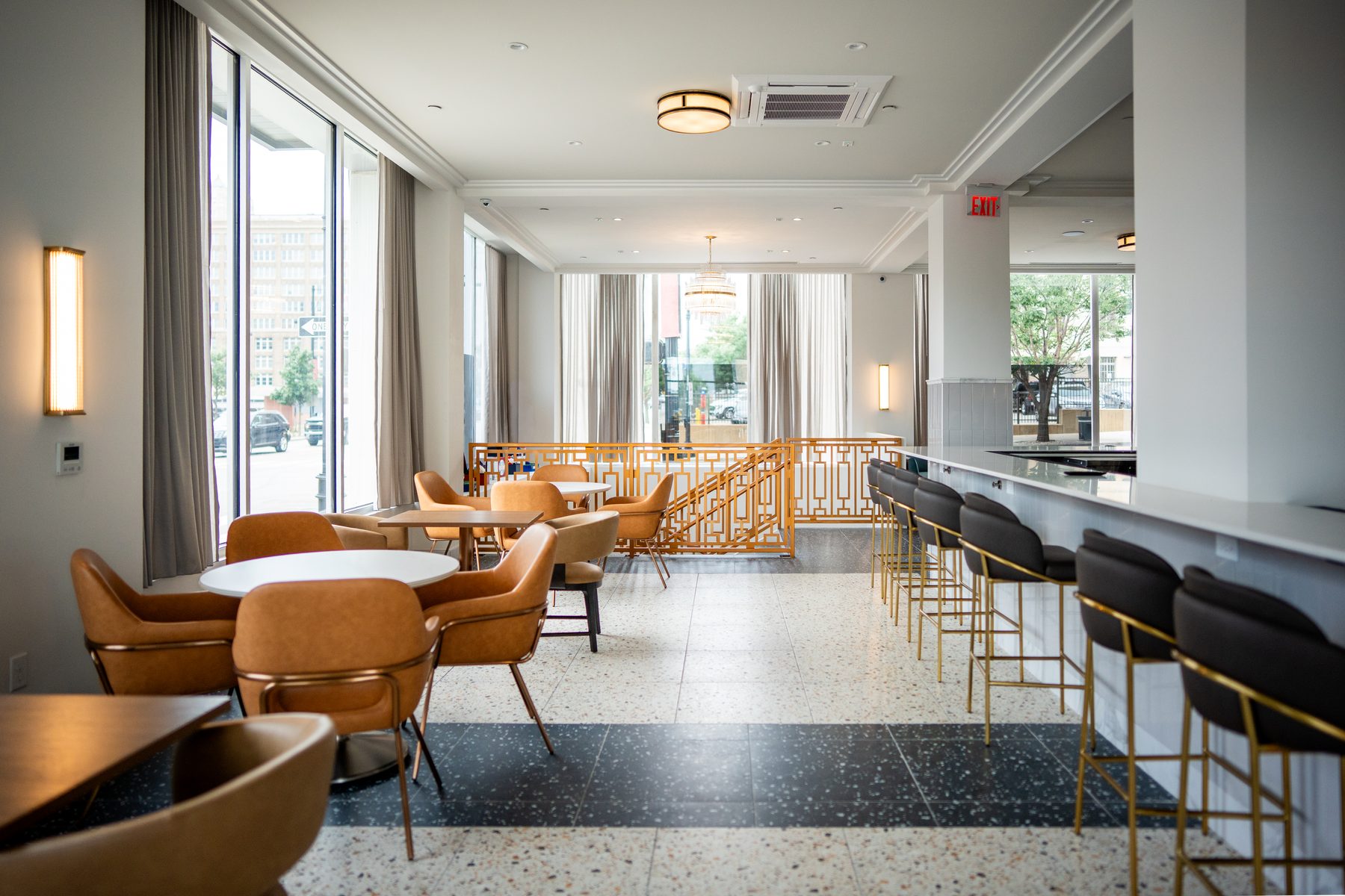 Bistro on Oak, the ground-floor restaurant and bar at Aiden Kansas City Downtown, in terrazzo and brass