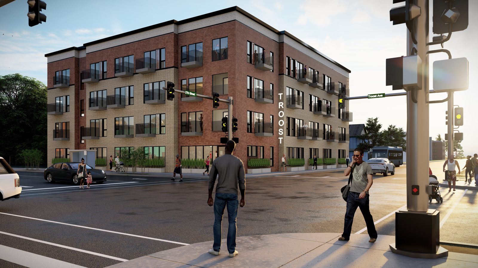 The new building at 27th and Troost as designed, four storeys of brick holding the corner with the Troost sign above the entrance
